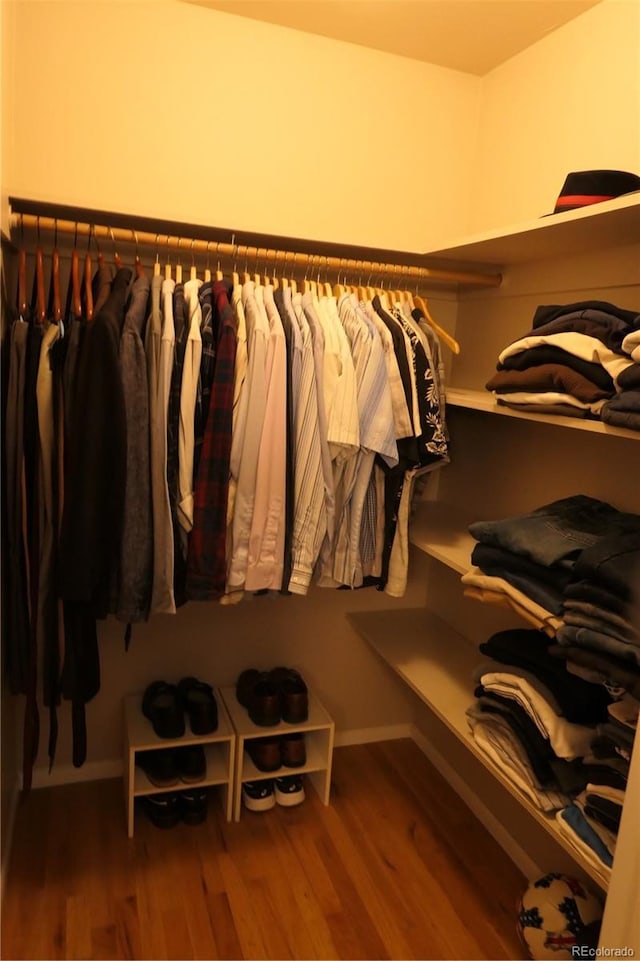 1936 S Poplar St, Denver, CO 80224 - walk in closet featuring wood finished floors