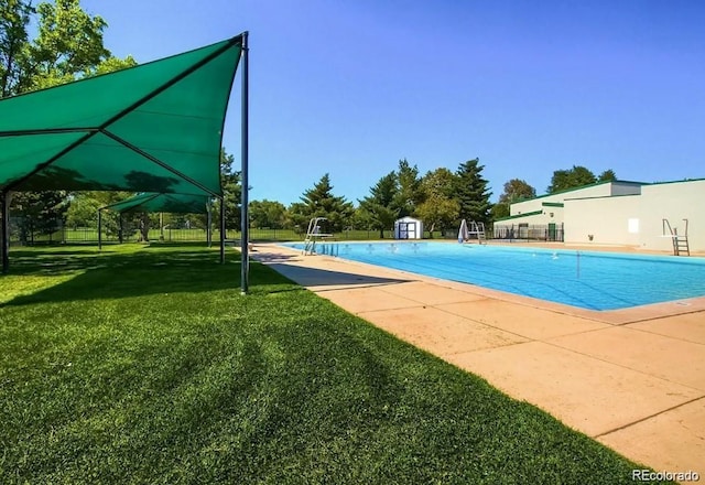 1936 S Poplar St, Denver, CO 80224 - community pool with a lawn