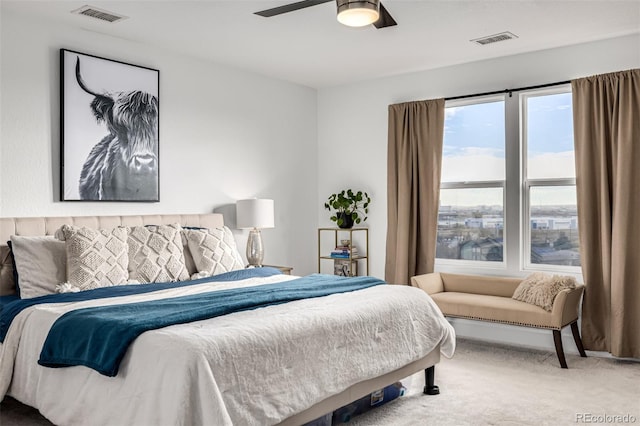 carpeted bedroom with ceiling fan