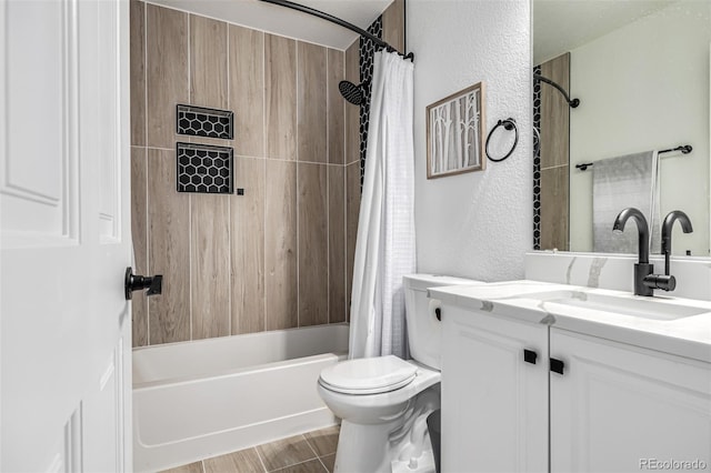 full bathroom featuring vanity, toilet, and shower / tub combo