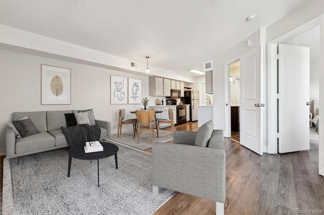 1820 Newland Ct Unit 210, Lakewood, CO 80214 - living area featuring dark wood-style floors