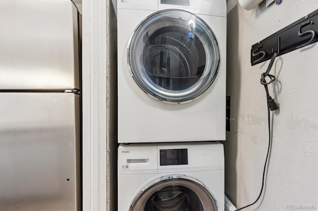 1820 Newland Ct Unit 210, Lakewood, CO 80214 - laundry area with stacked washer / drying machine
