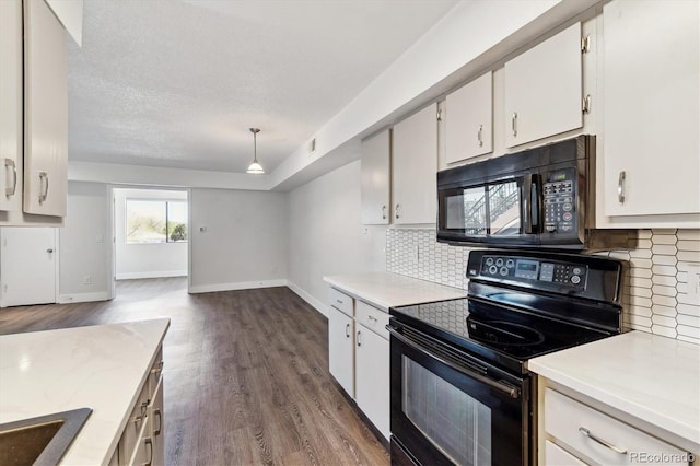 1820 Newland Ct Unit 210, Lakewood, CO 80214 - kitchen with black appliances, light countertops, baseboards, backsplash, and a textured ceiling