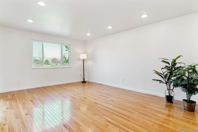 7158 W Roxbury Ave, Littleton, CO 80128 - spare room with recessed lighting, light wood-style floors, and baseboards