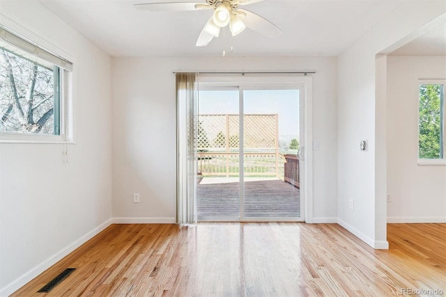 7158 W Roxbury Ave, Littleton, CO 80128 - unfurnished room with light wood-type flooring, baseboards, a ceiling fan, and visible vents