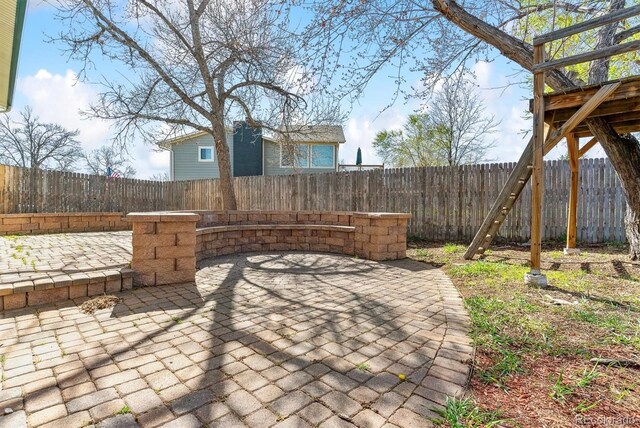 7158 W Roxbury Ave, Littleton, CO 80128 - view of patio / terrace featuring a fenced backyard