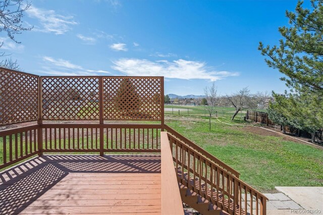 7158 W Roxbury Ave, Littleton, CO 80128 - deck with a lawn and a mountain view