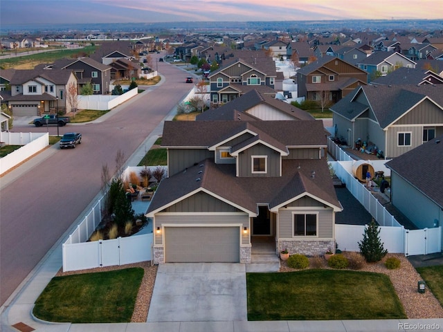 6093 Carmon Dr, Windsor, CO 80550 - aerial view at dusk featuring a residential view