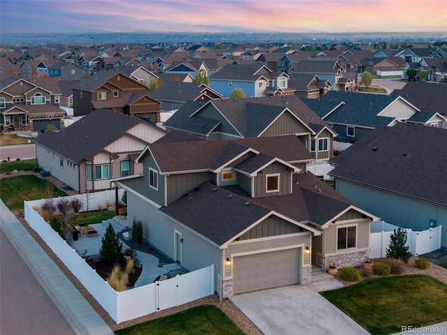 6093 Carmon Dr, Windsor, CO 80550 - aerial view at dusk with a residential view