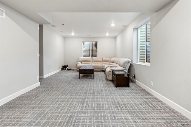 4504 N Picadilly Ct, Aurora, CO 80019 - carpeted living area with baseboards and recessed lighting