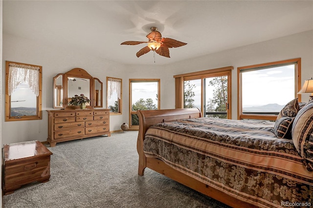 13954 Pine Country Ln, Conifer, CO 80433 - bedroom featuring carpet, access to exterior, and a ceiling fan