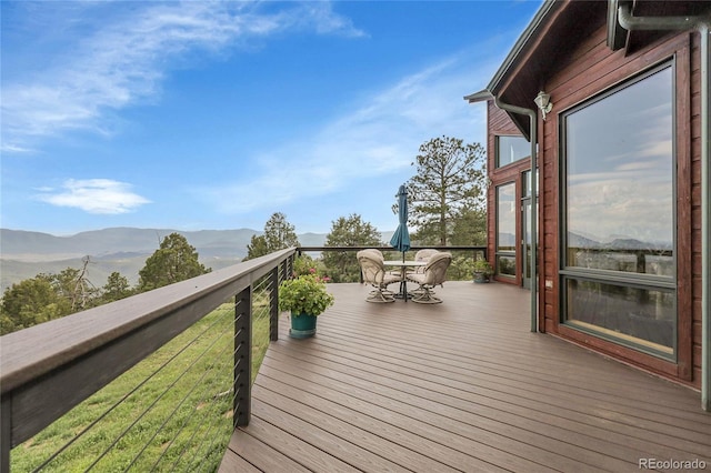 13954 Pine Country Ln, Conifer, CO 80433 - wooden deck featuring a mountain view