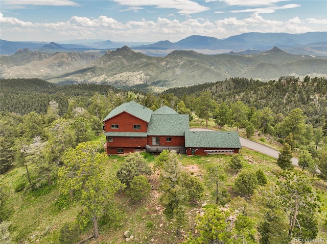 13954 Pine Country Ln, Conifer, CO 80433 - view of mountain background with a heavily wooded area