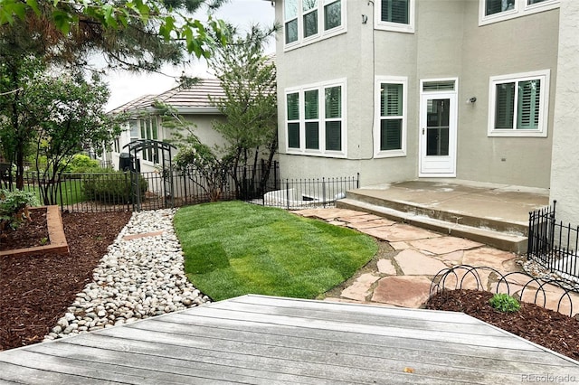 view of yard with a deck