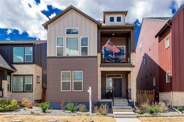 16762 Tejon Ln, Broomfield, CO 80023 - view of front of house featuring a balcony and board and batten siding