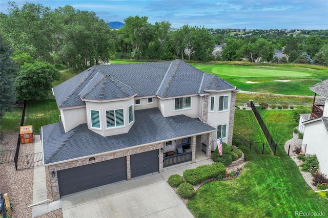 16862 W 65th Cir, Arvada, CO 80007 - french country home featuring stucco siding, stone siding, concrete driveway, and a garage