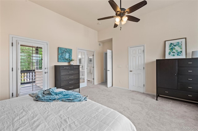 16862 W 65th Cir, Arvada, CO 80007 - bedroom with a high ceiling, light carpet, access to exterior, and ceiling fan