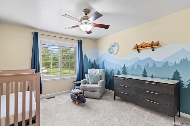 16862 W 65th Cir, Arvada, CO 80007 - bedroom featuring light carpet and a ceiling fan