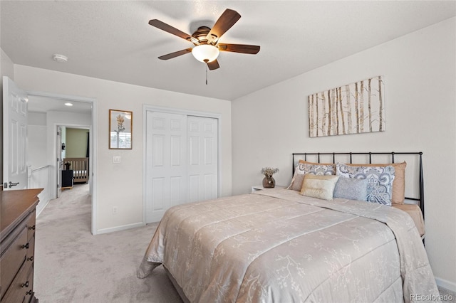 16862 W 65th Cir, Arvada, CO 80007 - carpeted bedroom with a closet and ceiling fan