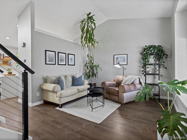 20789 E Princeton Pl, Aurora, CO 80013 - living area with lofted ceiling, wood finished floors, baseboards, and stairs