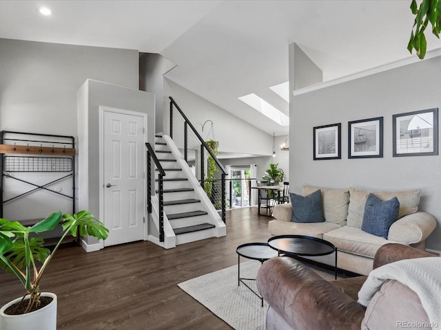 20789 E Princeton Pl, Aurora, CO 80013 - living room featuring a skylight, stairway, wood finished floors, recessed lighting, and high vaulted ceiling
