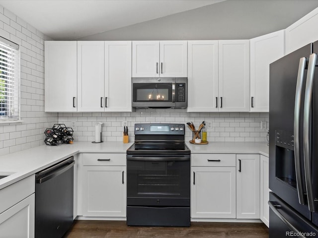 20789 E Princeton Pl, Aurora, CO 80013 - kitchen with stainless steel appliances, lofted ceiling, light countertops, and white cabinetry