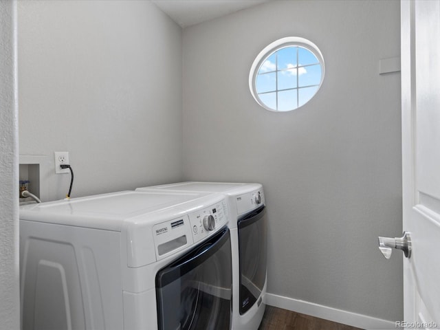 20789 E Princeton Pl, Aurora, CO 80013 - laundry area featuring separate washer and dryer, dark wood-style flooring, and baseboards