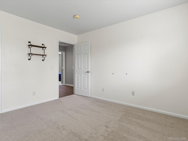 20789 E Princeton Pl, Aurora, CO 80013 - carpeted spare room featuring baseboards and a smoke detector