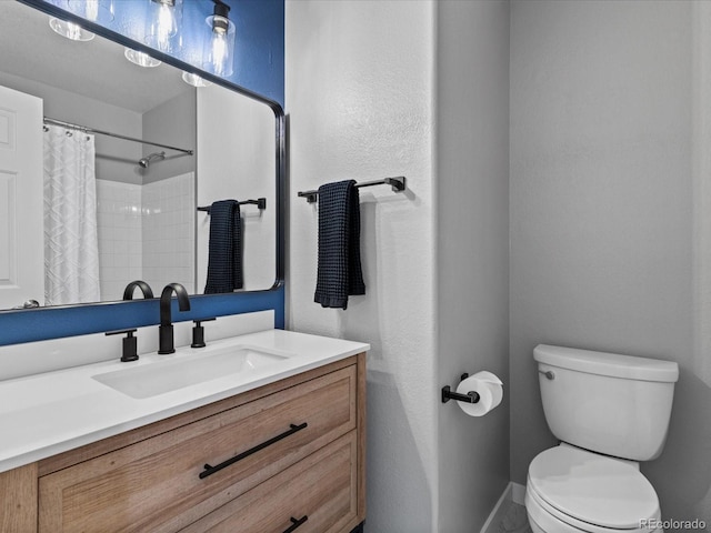 20789 E Princeton Pl, Aurora, CO 80013 - full bathroom with toilet, vanity, and a shower with curtain