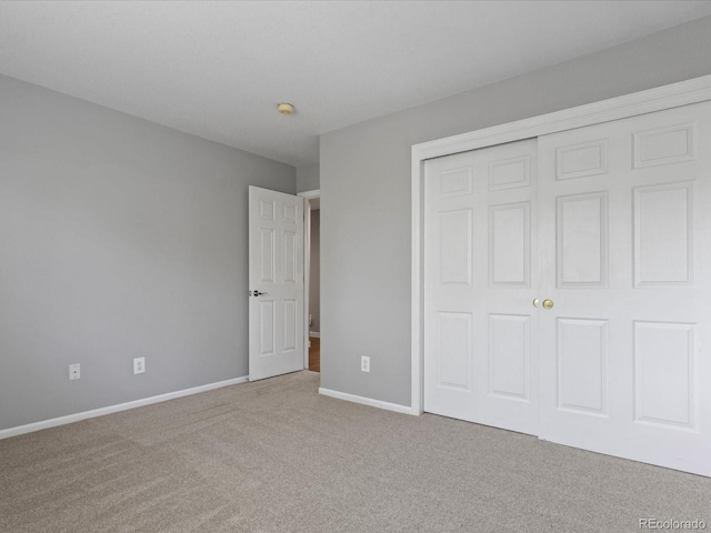 20789 E Princeton Pl, Aurora, CO 80013 - unfurnished bedroom with carpet, a closet, and baseboards