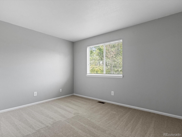 20789 E Princeton Pl, Aurora, CO 80013 - carpeted spare room featuring baseboards