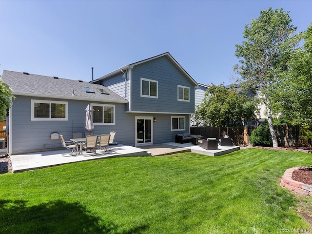 20789 E Princeton Pl, Aurora, CO 80013 - back of house featuring an outdoor living space and a patio