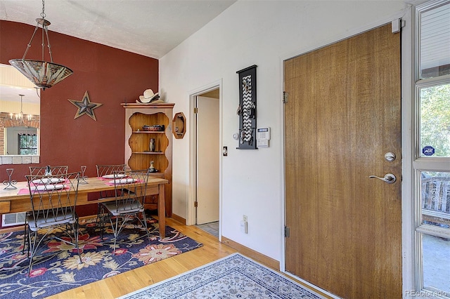 dining room with light wood-type flooring