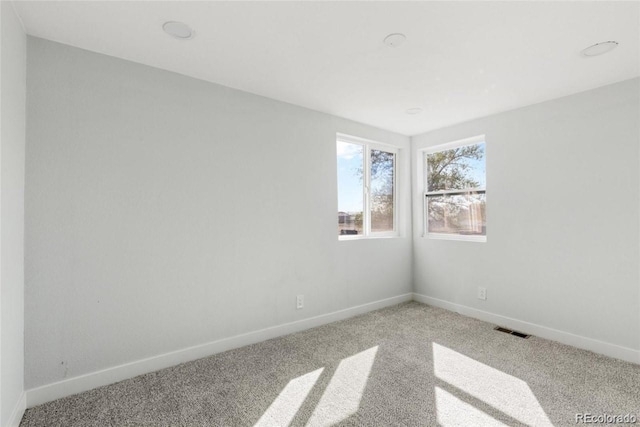 view of carpeted spare room