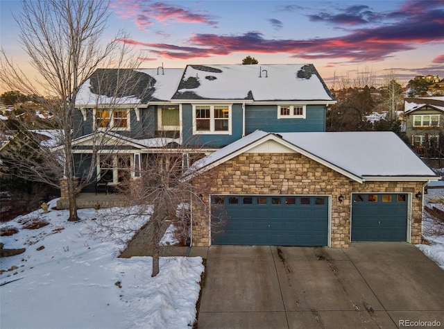 view of front of property featuring a garage