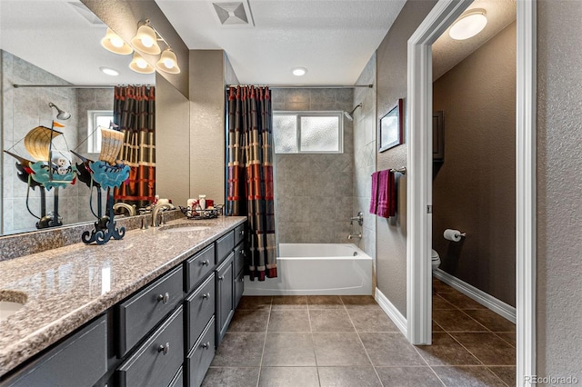 full bathroom with toilet, shower / tub combo, a textured ceiling, vanity, and tile patterned flooring