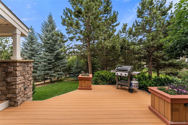 deck featuring grilling area