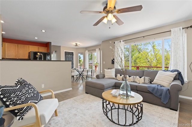 2043 Fendlebrush St, Highlands Ranch, CO 80129 - living area with baseboards, wood finished floors, ceiling fan, and recessed lighting