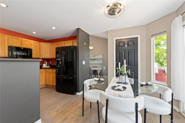 2043 Fendlebrush St, Highlands Ranch, CO 80129 - dining space with light wood finished floors, recessed lighting, and baseboards