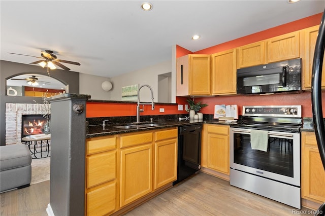 2043 Fendlebrush St, Highlands Ranch, CO 80129 - kitchen with black appliances, a sink, light wood-style floors, ceiling fan, and recessed lighting