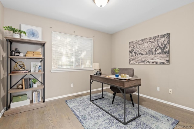 2043 Fendlebrush St, Highlands Ranch, CO 80129 - office area with wood finished floors and baseboards