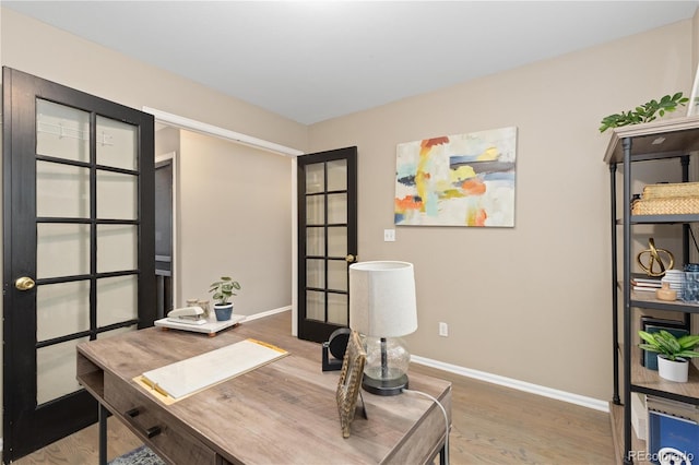 2043 Fendlebrush St, Highlands Ranch, CO 80129 - office space featuring baseboards, wood finished floors, and french doors