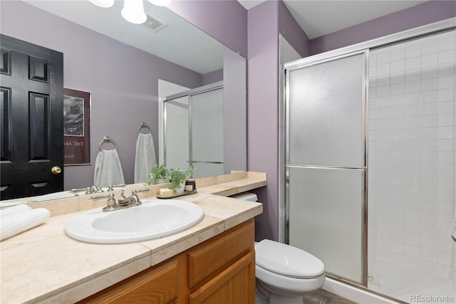 2043 Fendlebrush St, Highlands Ranch, CO 80129 - bathroom with a shower stall, vanity, and toilet