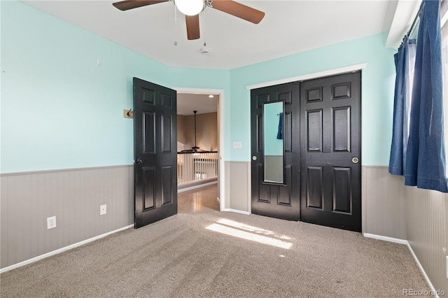 2043 Fendlebrush St, Highlands Ranch, CO 80129 - unfurnished bedroom with wainscoting, carpet flooring, and a ceiling fan