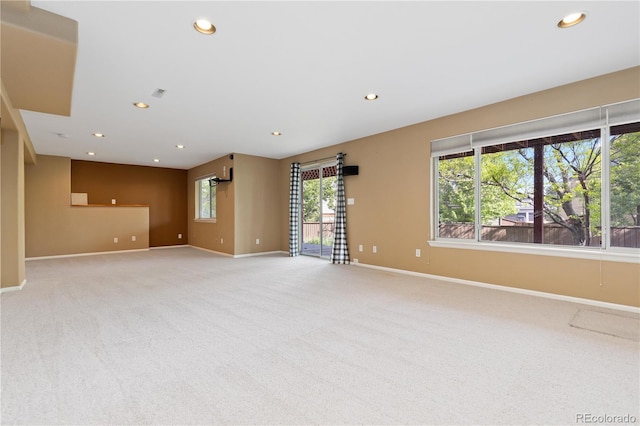 2043 Fendlebrush St, Highlands Ranch, CO 80129 - spare room featuring baseboards, light colored carpet, and recessed lighting