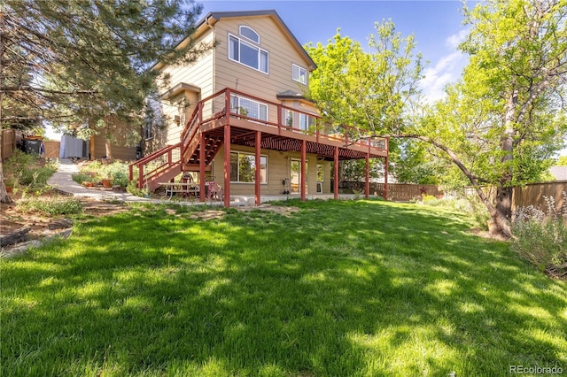 2043 Fendlebrush St, Highlands Ranch, CO 80129 - back of house featuring a wooden deck and stairway