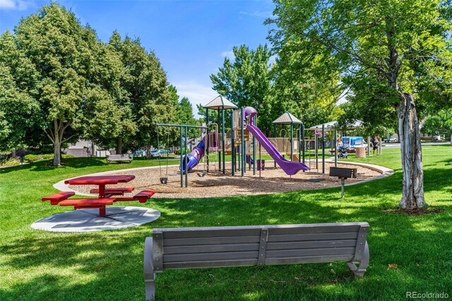 view of playground with a yard