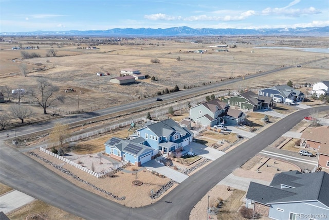 birds eye view of property featuring a residential view and a mountain view