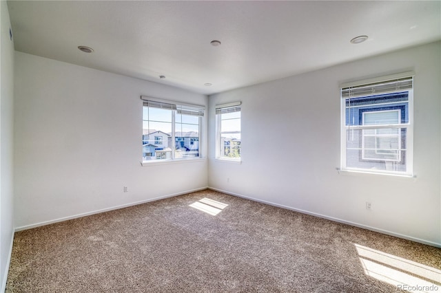 view of carpeted spare room