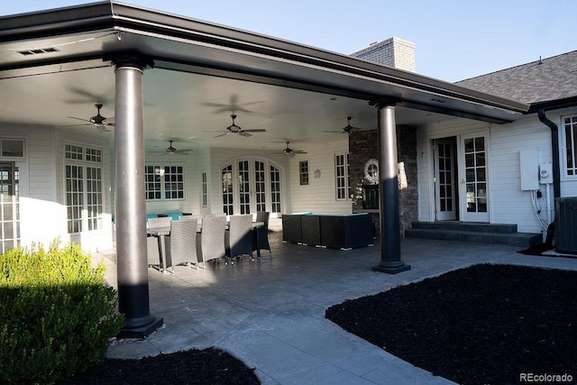 view of patio / terrace featuring a ceiling fan, outdoor lounge area, and central AC unit